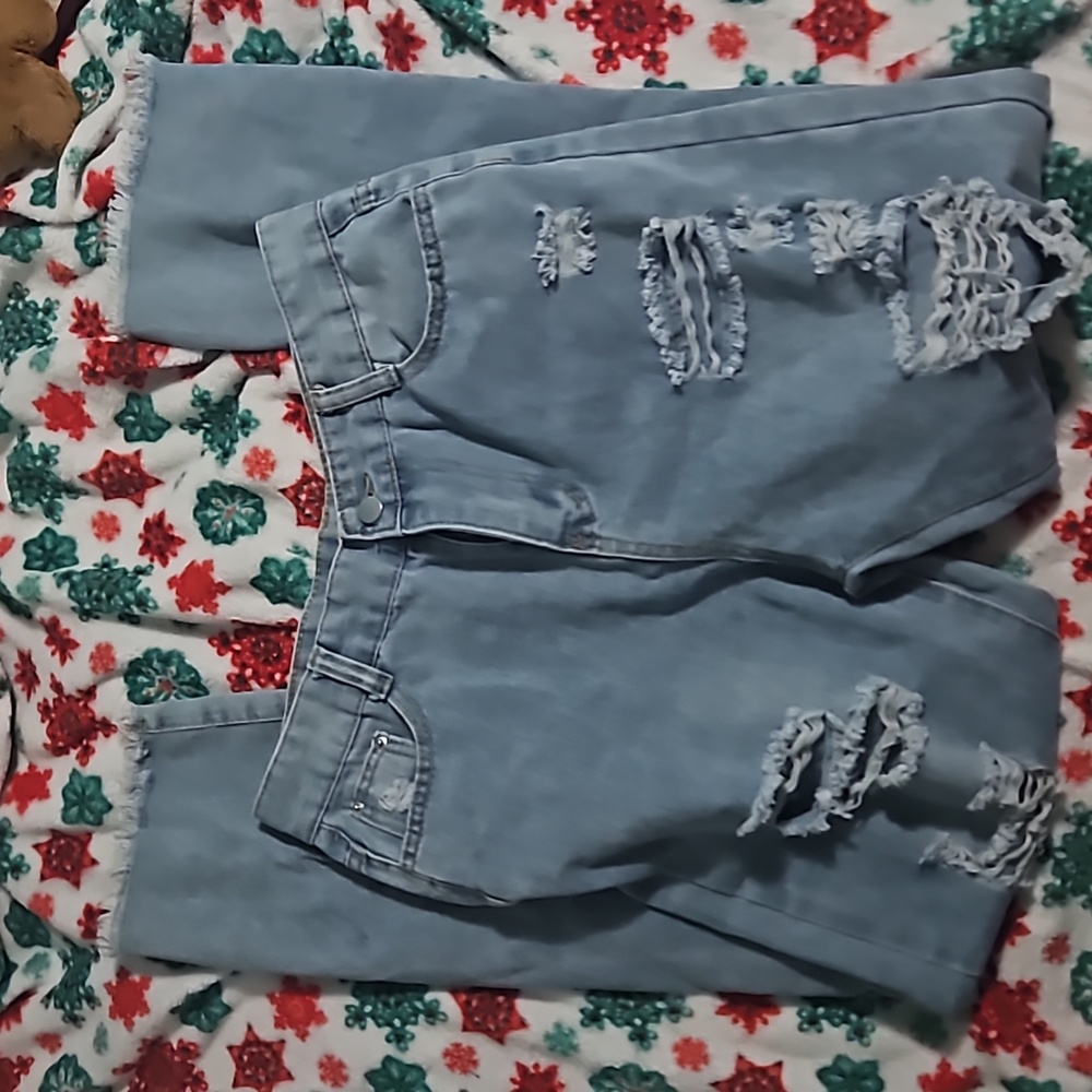 Ripped blue jeans